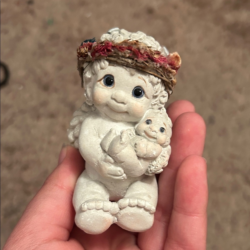 Adorable Figurine with Baby